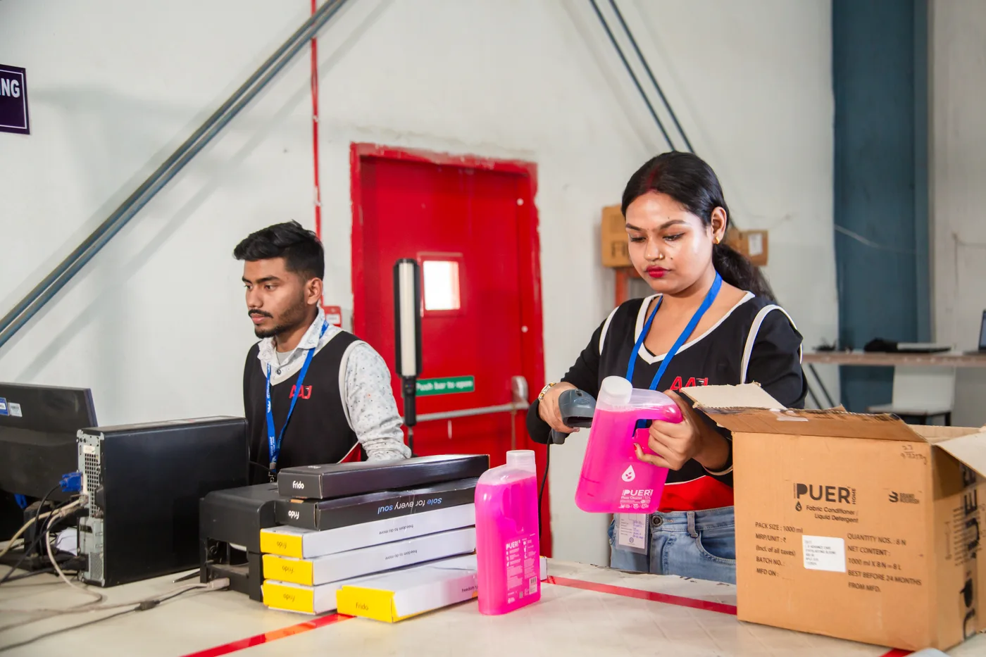 AAJ Supply Chain Management warehouse team organising racked inventory ahead of the Independence Day Sale