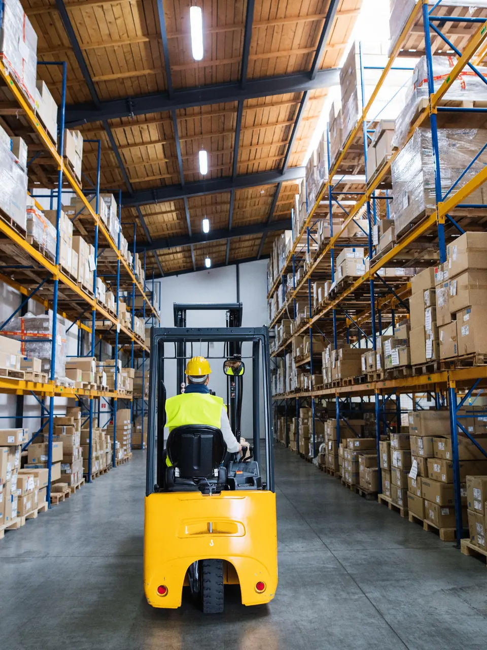 Warehouse operator managing bulk B2B inventory movement
